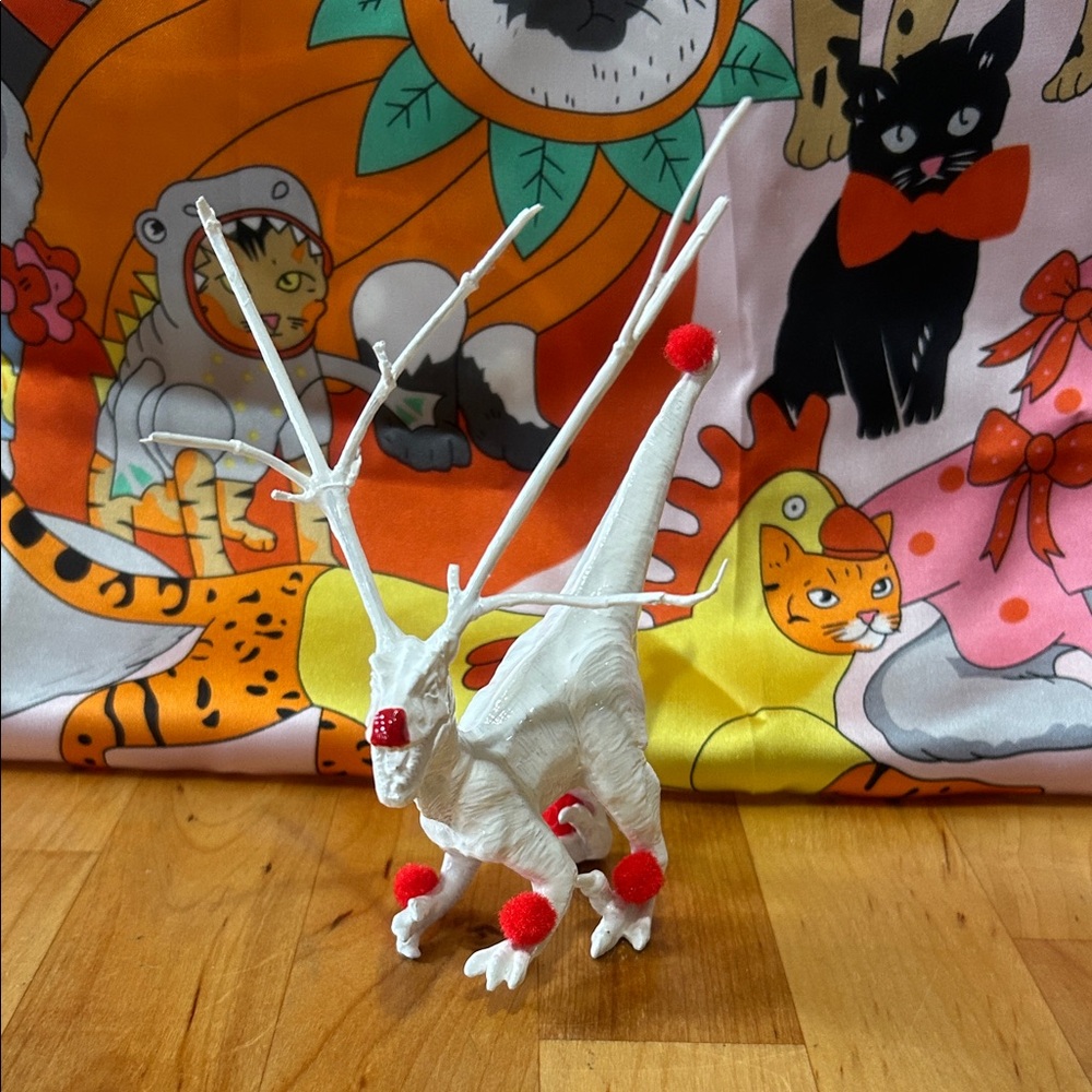 Rudolph the red-nosed dinosaur holiday decor